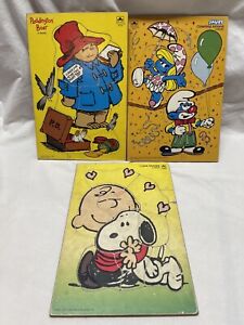 Lot of 3 Vintage Wooden Puzzles Smurfs Paddington Bear Charlie Brown Snoopy