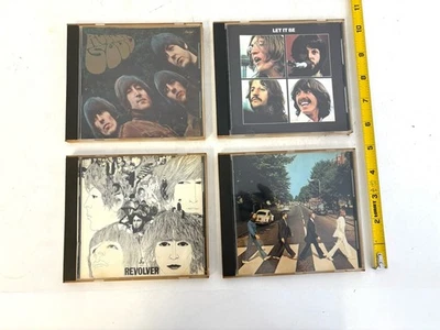 The Beatles Lot of 4 CDs Abbey Road, Revolver, Let it Be, Rubber Soul - Image 1 of 4