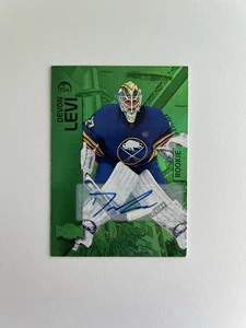 2023-24 Skybox Metal Universe Rookies Devon Levi #194 Green /10 Rookie Auto RC - Picture 1 of 3
