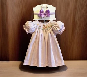 Mädchen Neu mit Etikett Petit Bebe by Anavini gesmoktes Kleid Bilderbuch Kaninchenfreie Schleife 3 Monate - Bild 1 von 10