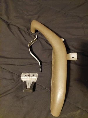 Toyota Tundra Sequoia 2001-2007 panel de puerta tirador reposabrazos delantero izquierdo marrón OEM Foto 1 de 4