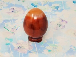 Poliertes Karneol Stein Ei (1,92" - 2,38") mit Ständer - 191 g aus Madagaskar - Bild 1 von 4