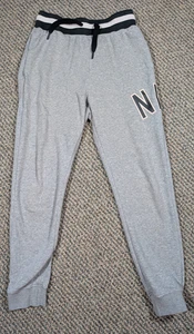 Nike Jogginghose Herren Gr. S Grau Loose Fit Sweatpants Logo Taschen CN9127-063 - Bild 1 von 13