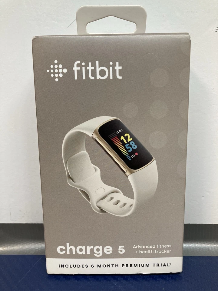 Fitbit Charge 5 Rastreador Avanzado de Ejercicio y Salud - Dorado Suave con Blanco Lunar  Foto 1 de 4