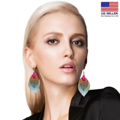 Moda Mujeres Joyería Pendientes Doble Hojas Huecas Textura Pasador Gancho Niña 0997 Foto 1 de 4