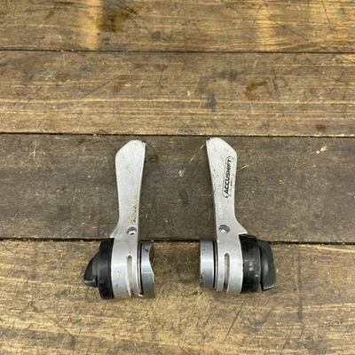 De colección Suntour Accushift 7 Velocidades Downtube Shifters 7s Indexado Japón Bicicleta Soldadura Foto 1 de 4