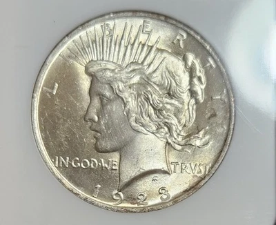 1923 Silver Peace Dollar NGC MS64 - Older Holder In Excellent Shape- Gold Tone - Image 1 of 4