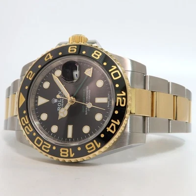Rolex GMT-Master II acero inoxidable y oro amarillo esfera negra automático 116713LN Foto 1 de 4