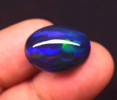 Pedra preciosa cabochão opala multifogo etíope natural borrada preta 11,9 quilates - Imagem 1 de 4