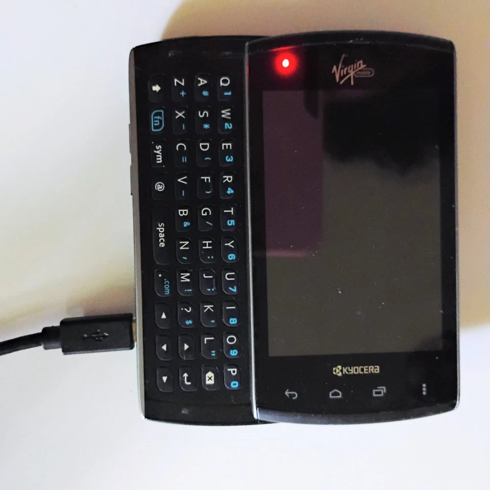 Teléfono deslizante Virgin Mobile Kyocera Rise Android 2012 funciona en muy buena condición Foto 1 de 4