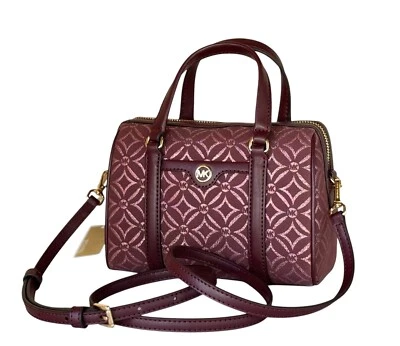 MICHAEL KORS TRAVEL SM DUFFLE CROSSBODY BAG GRAPHIC LOGO GLITTER OXBLOOD MULTI - Image 1 of 4