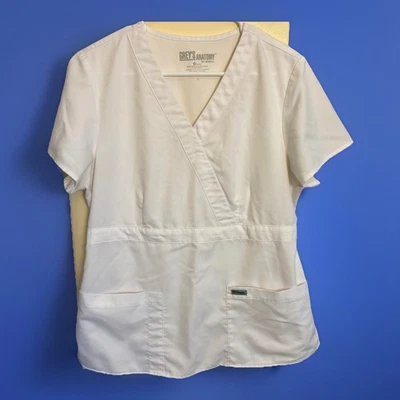 Blusa esfoliante Grey's Anatomy Barco 2 bolsos simulada branca feminina tamanho grande - Imagem 1 de 4