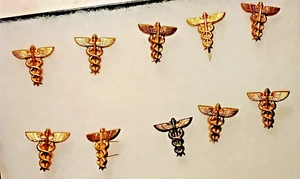 10 WWII brass reproduction Medical Corps insignia, $22.00 + $5.00 ship/$2.20 ea - Picture 1 of 3