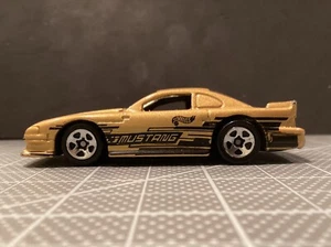 Hot Wheels - Mustang Cobra (1997) Diecast Car - Gold/Black / Used - Picture 1 of 7