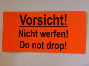 10x Versandaufkleber Warnediketten in orange  " Vorsicht ! nicht werfen ! ..." - Bild 1 von 1