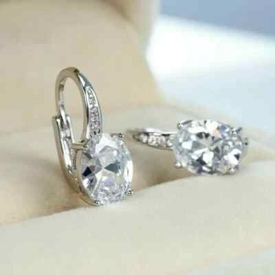 Pendientes colgantes/gotas de diamantes de corte ovalado de 4,00 quilates con acabado en oro blanco de 14 quilates Foto 1 de 4