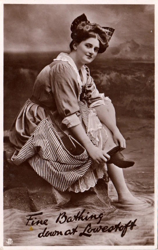lowestoft real photo novelty  postcard,lady at beach  circa 1910 - Image 1 of 1