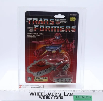 Minicar Hasbro Warpath AFA 80/80/90 Transformers 1985 nuevo sellado Foto 1 de 4