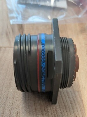 Amphenol D38999/20WG75PN Panel Mount Coax Connector with Cap - Image 1 of 4