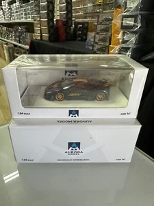 FERRARI F8XX MANSORY METALLIC CHAMELEON MAGIC 1/64 DIECAST BY AURORA MODEL AM - Picture 1 of 2