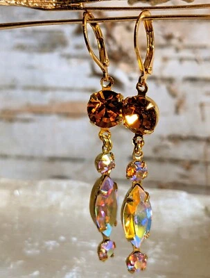 Pendientes desplegables chapados en oro en cristal de Swarovski AB metálico amarillo y naranja  Foto 1 de 4
