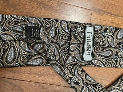 Corbata de seda (hombre) cachemira dorada y azul claro sobre fondo negro Foto 1 de 2