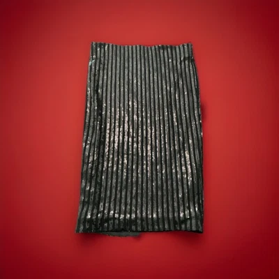 Falda negra tubo elástico lentejuelas GUESS para mujer talla: pequeña usada perfecto estado. Foto 1 de 4