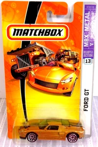 2006 Matchbox #13 MBX Metal FORD GT Gold & Chrome Lace Spoke Wheels K9474 NEW! - Picture 1 of 3