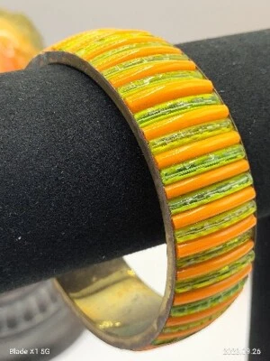 Vintage Strips of Crystal Green Acrylic Orange Brass Bangle Bracelet  - Image 1 of 4