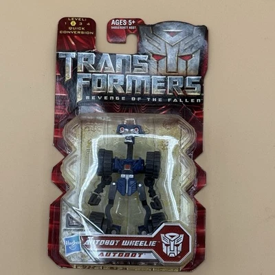 Transformers Autobot Wheelie CLASE DE LUJO 2009 La venganza de los caídos sellado nuevo en caja Foto 1 de 4