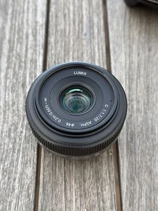 Lumix micro 4/3 20mm lens, f/1.7 silver w/ ND filter - Picture 1 of 5