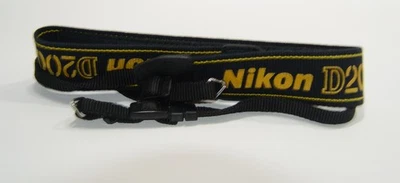 Correa para el cuello Nikon D200 genuina OEM negra/amarilla en excelente estado con anillos de metal Foto 1 de 4