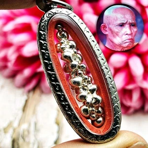 Amuleto Huan Thai Leklai Si Ngern plata protección inmortal vida inofensivo 0112 - Imagen 1 de 10