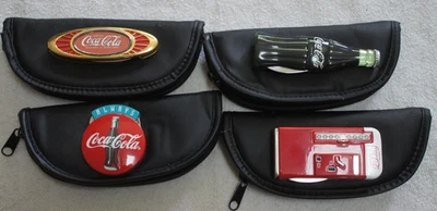 Franklin Mint Coca-Cola Collector Knives Set of 4 with black pouches - Image 1 of 4