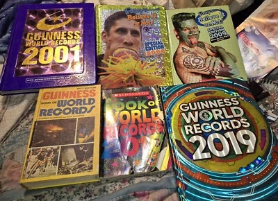 3 Guinness Books; 2 Believe It Or Not; Scholastic World Record; 1977 Guinness  - Image 1 of 4