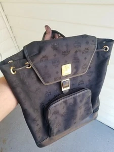 Authentic MCM Vintage Logo Black Flap Drawstring Small Backpack - Picture 1 of 2