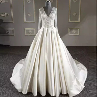Elegantes vestidos de novia de satén con cuello en V mangas largas apliques de encaje vestidos de novia Foto 1 de 4