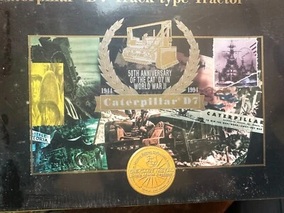 CATERPILLAR 50TH ANNIVERSARY D-7 BY NZG WITH BOOKS - Image 1 of 4