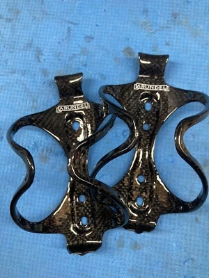Par de jaulas para botellas de agua de fibra de carbono con mandíbula Arundel negra bicicleta de carretera 3k brillante Foto 1 de 4