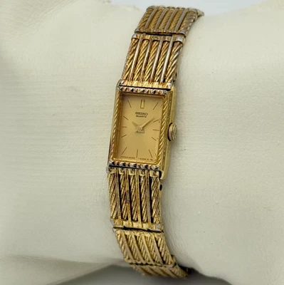 Reloj pulsera pequeño vintage años 80 SEIKO tono dorado para dama, 12 mm, funciona 2E20-5269 Foto 1 de 4