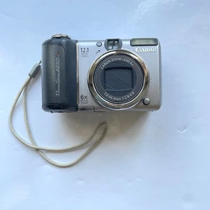 Lens Scratch - Canon PowerShot A650 IS 12.1MP Flip Screen Digital Camera - Picture 1 of 18
