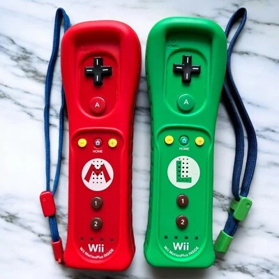 Nintendo Official Remote controller plus Mario & Luigi wii Used - Image 1 of 4