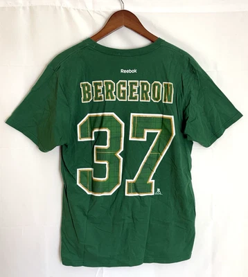 Camiseta verde grande Patrice Bergeron Boston Bruins #37 para hombre día de San Patricio Foto 1 de 4