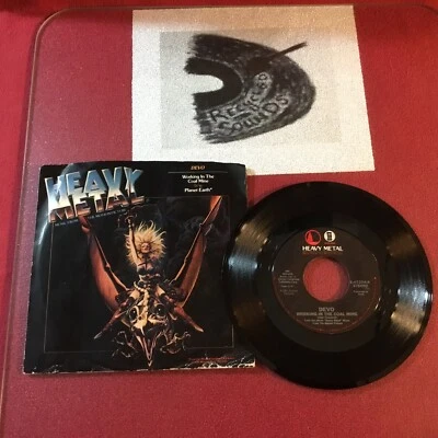 Devo – Working In The Coal Mine.  *1981 Vinyl (EX-)  7", 45 RPM, Heavy Metal Foto 1 de 4