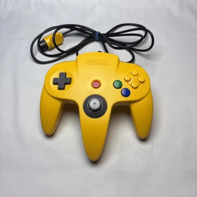 Mando Oficial Nintendo 64 Amarillo OEM N64 Original Tight Stick Foto 1 de 4