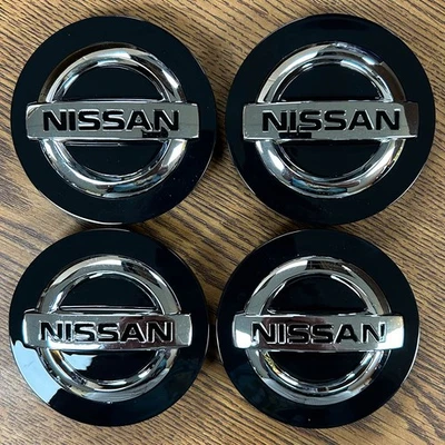 Juego de tapa central negra #40342-5ZM0B Nissan Armada, Titan OEM 3 5/16" Foto 1 de 3