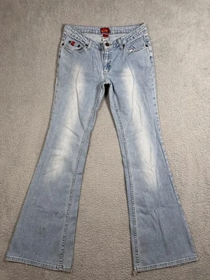 Pantalones de mezclilla elásticos tiro bajo acampanados lavado ligero largo Tilt Y2K para mujer Foto 1 de 4