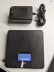 Linksys Cisco CM100 Cable Modem USB Ethernet with AC Adapter DOCSIS 1.0 1.1 2.0 - Picture 1 of 3