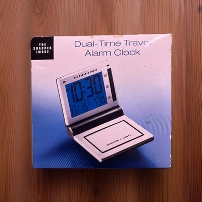 Sharper Image Dual-Time Folding Travel Alarm Clock Sealed (NEW) - Image 1 of 2