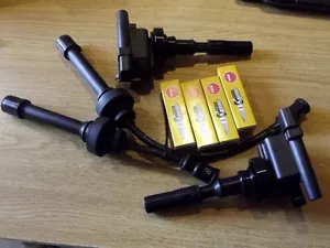 Paquete de bobinas de encendido HT cables y bujías conjunto Mitsubishi Pajero Jr Junior 1.1 - Imagen 1 de 1